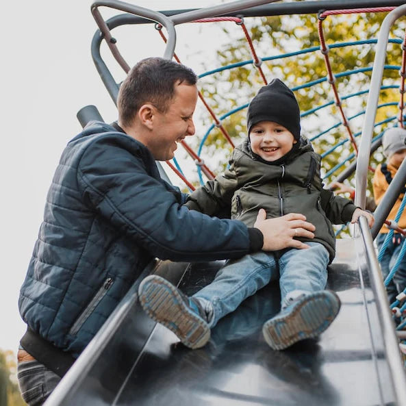 Father and child playing together